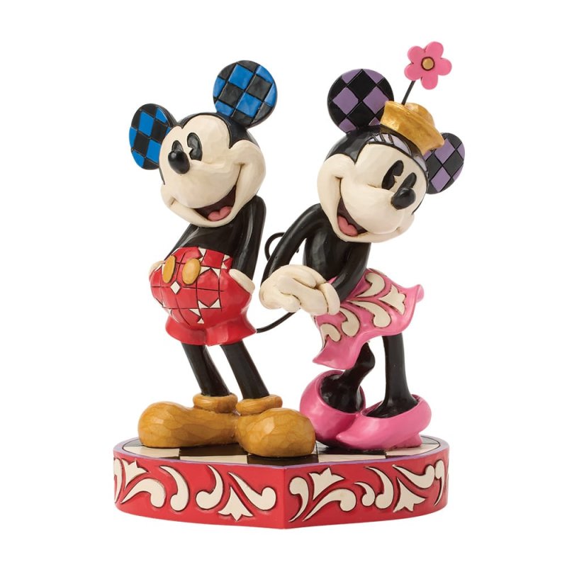 Minnie and Mickey mouse figurine on a white background