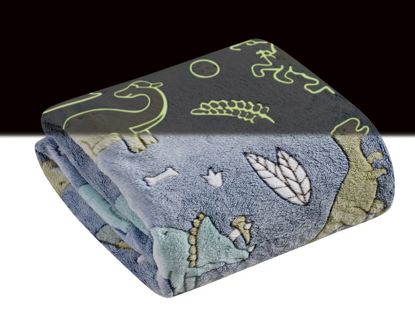 folded dinosaur blanket showing glow