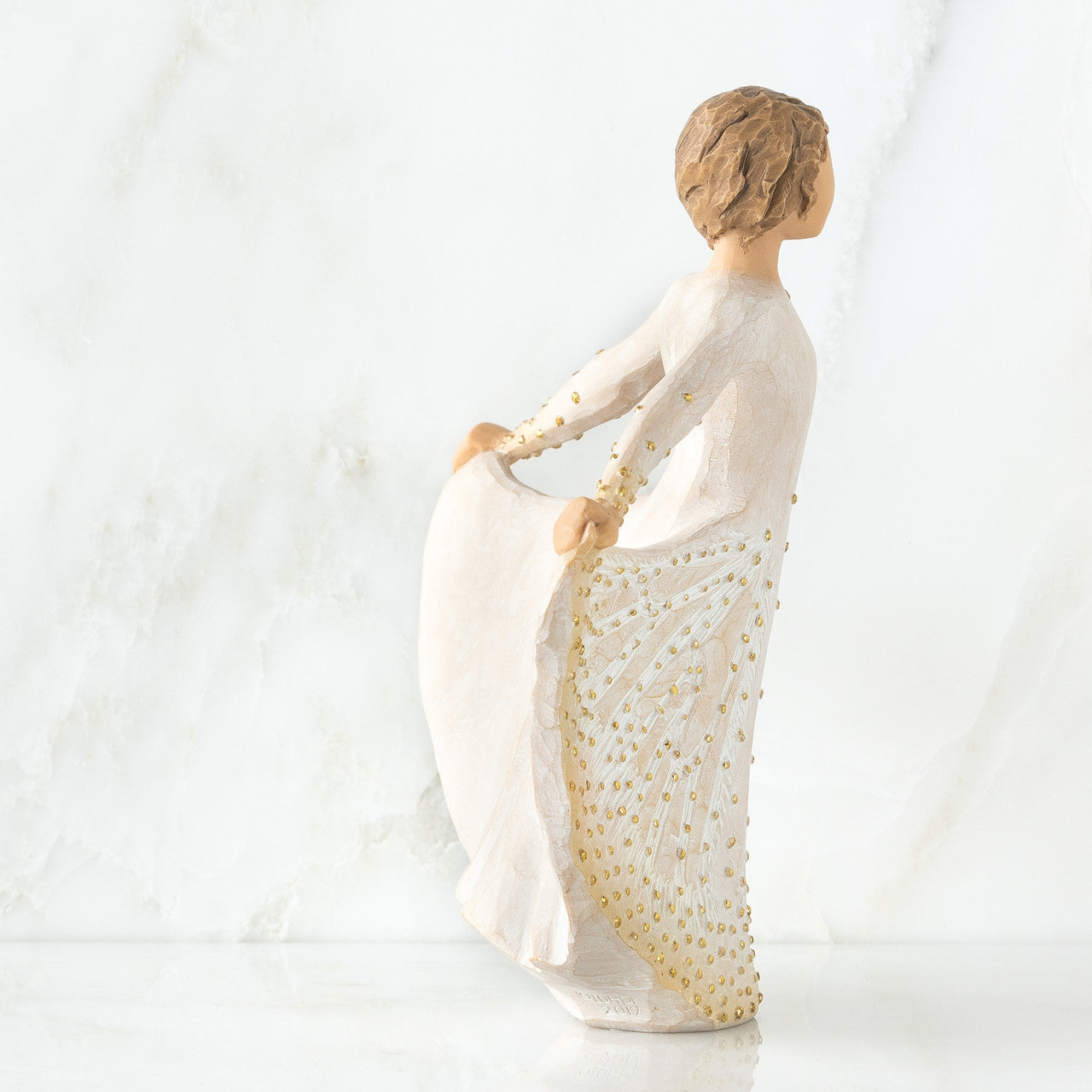 figurine side