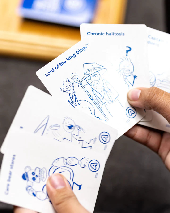person holding cards