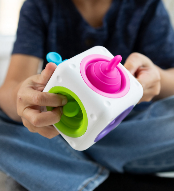 child playing with tugl