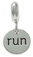 A silver circle charm with the word 'run' engraved on it