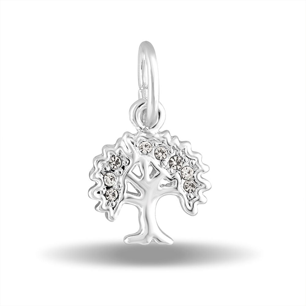A silver charm in the shape of the Tree of Life, adorned with small crystals.