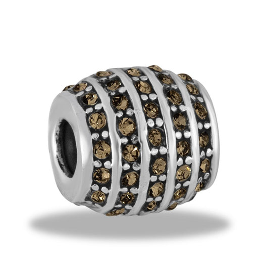 A gold and silver spacer bead from Davinci Beads