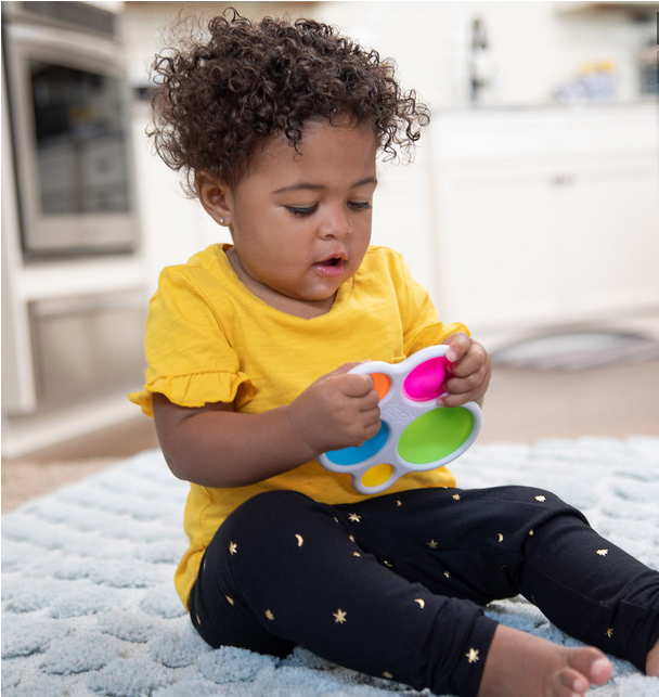 child playing with dimpl