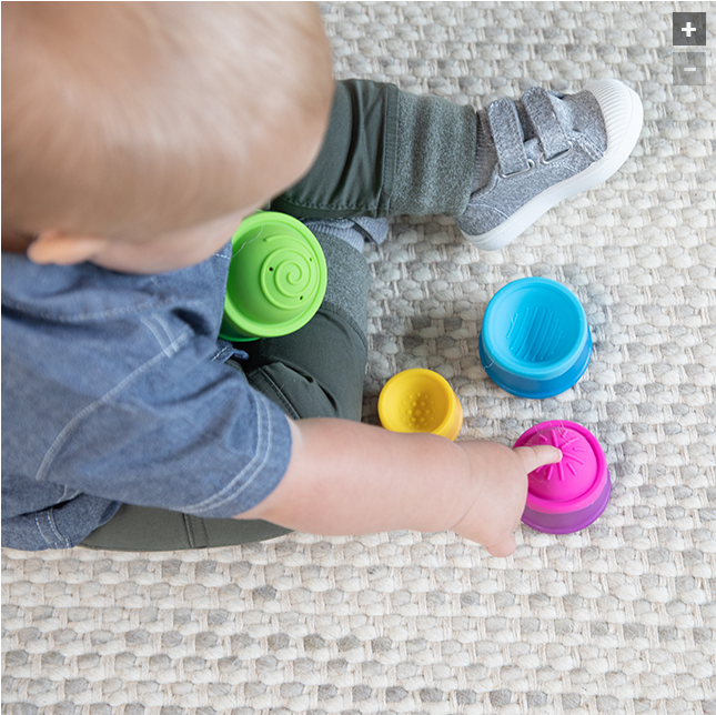 kids playing with dimpl stack