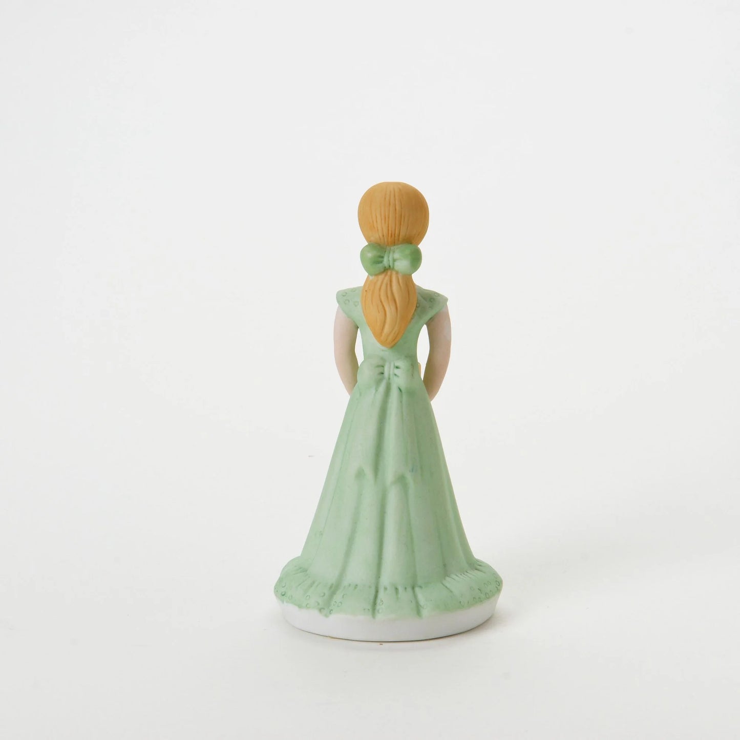 age 11 figurine back