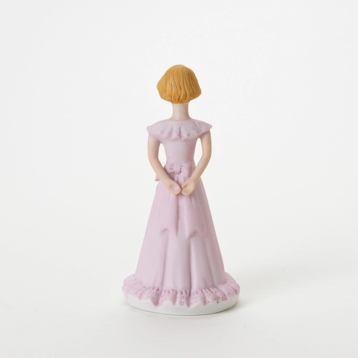age 13 figurine back