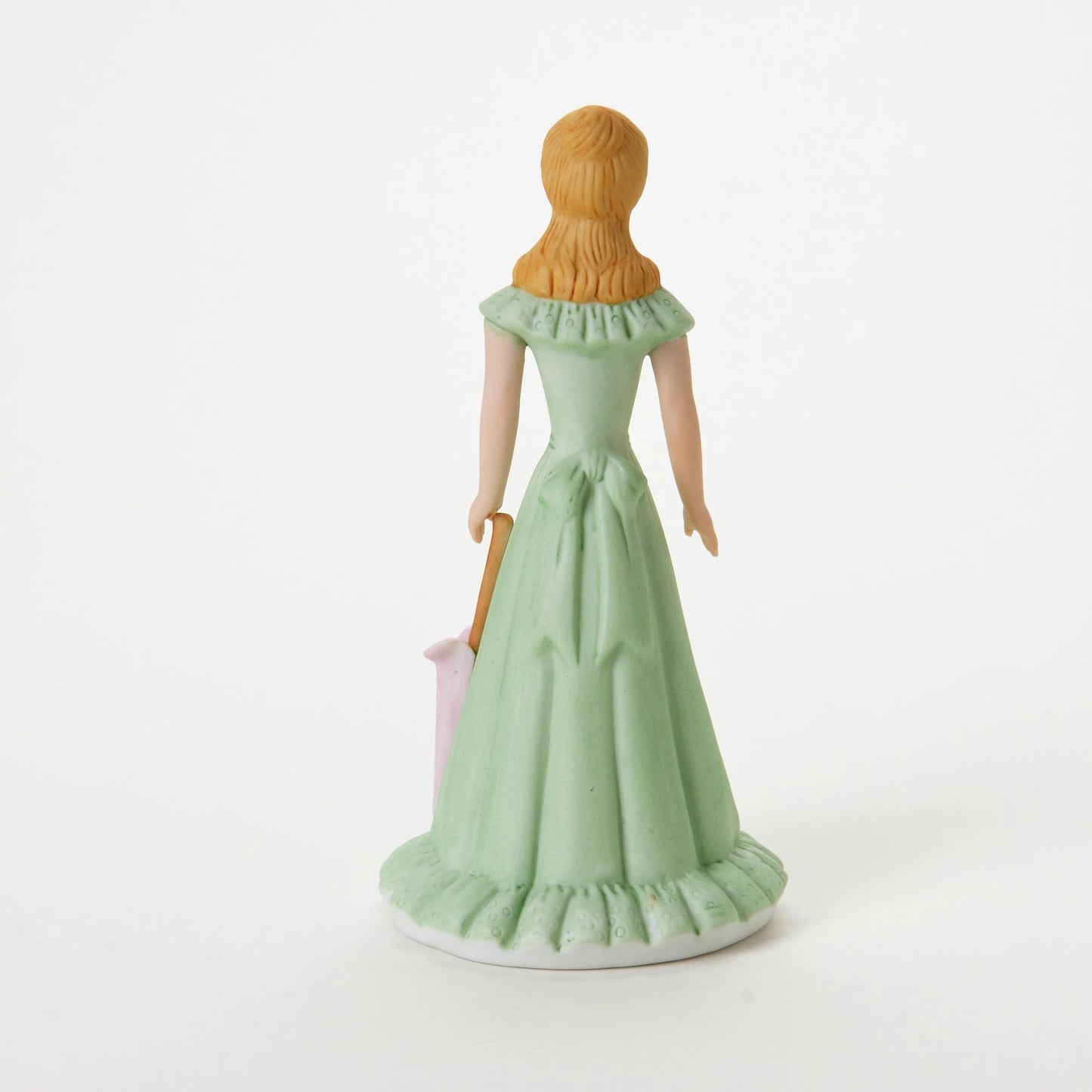 age 15 figurine back
