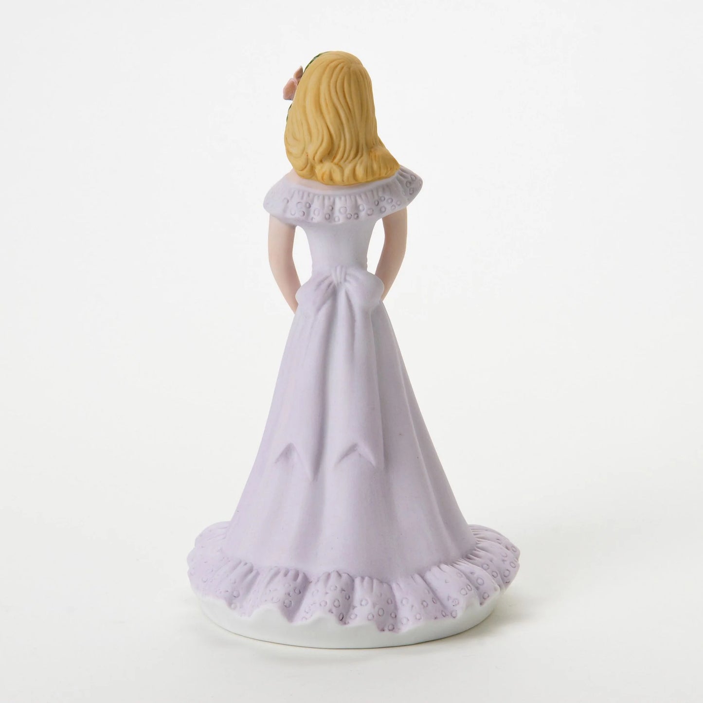 age 16 figurine back