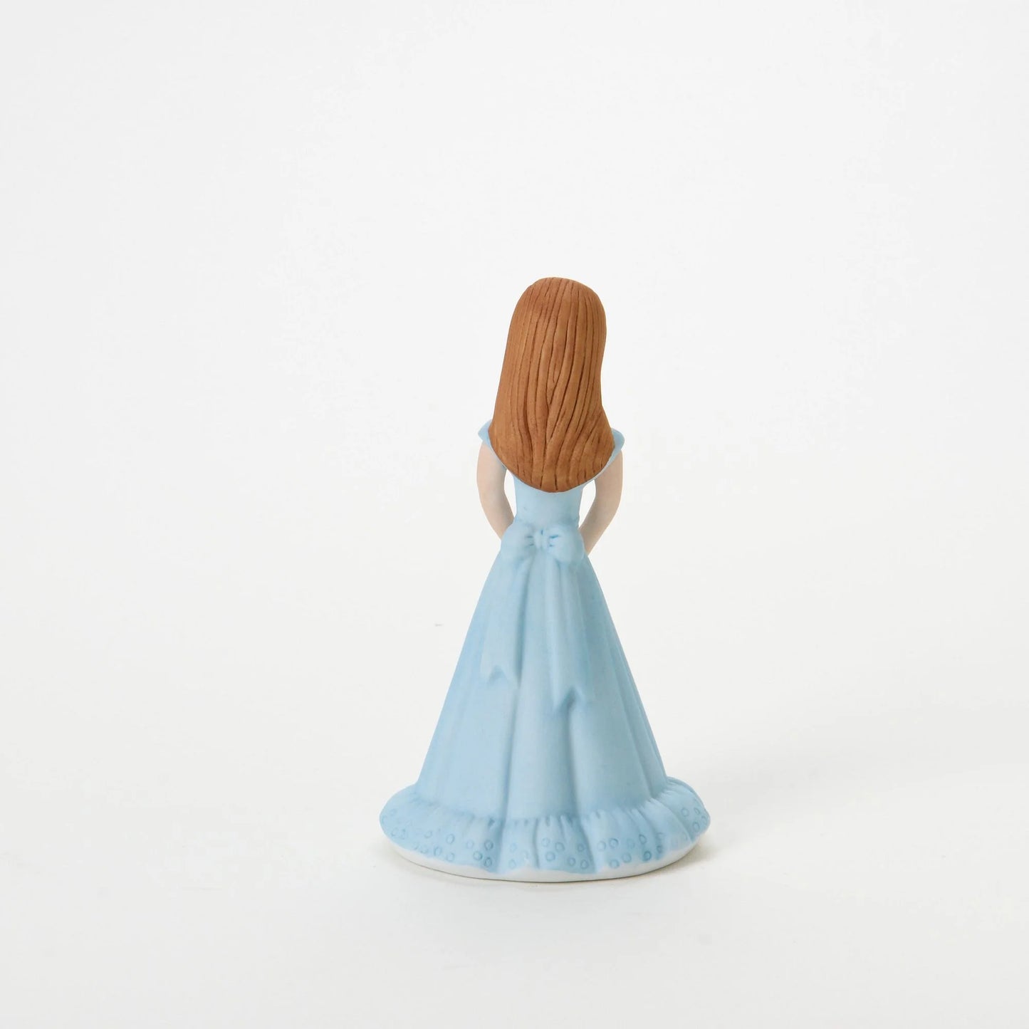 age 10 figurine back