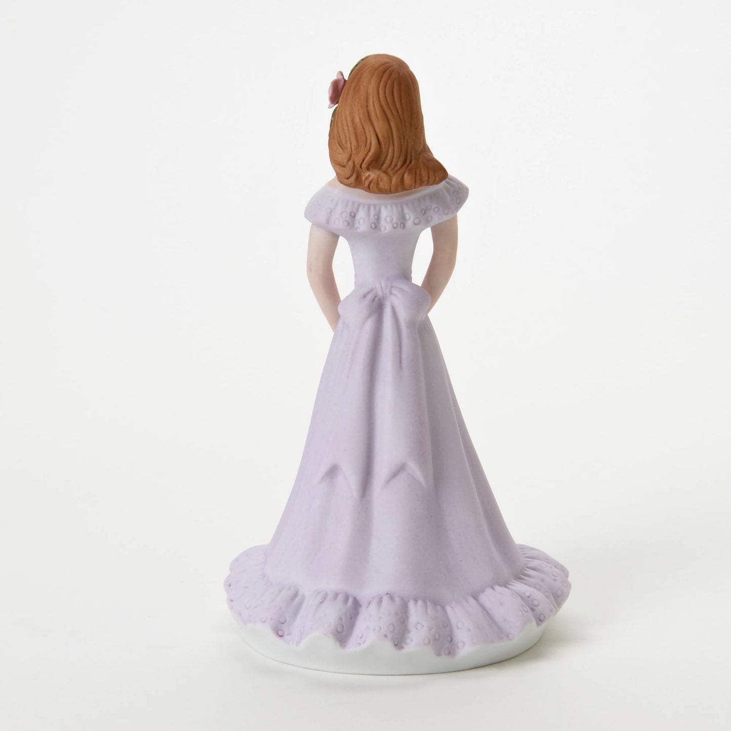 age 16 figurine back