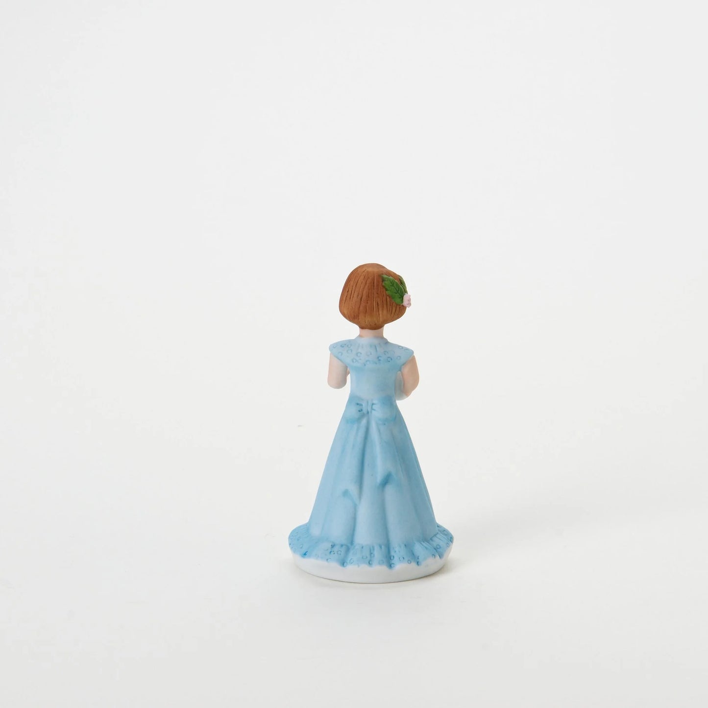 age 6 figurine back
