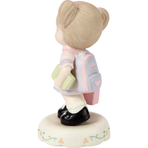 age 5 figurine back
