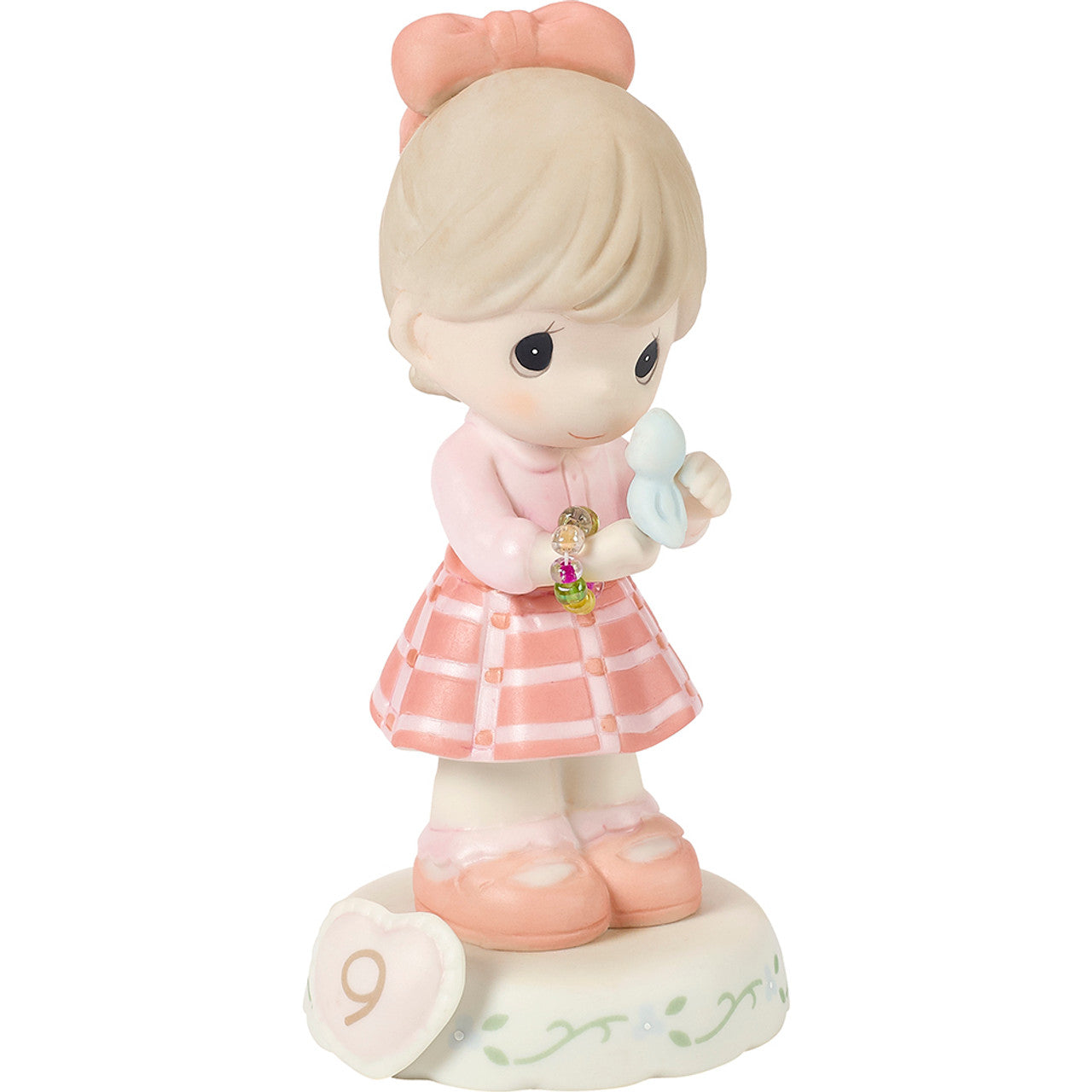 age 9 figurine side