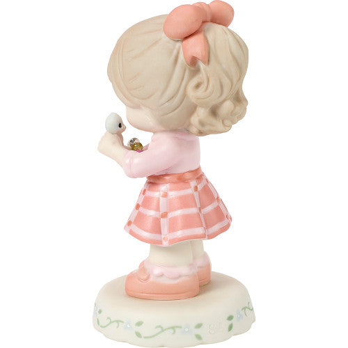 age 9 figurine back