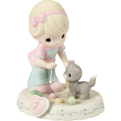 age 7 figurine side