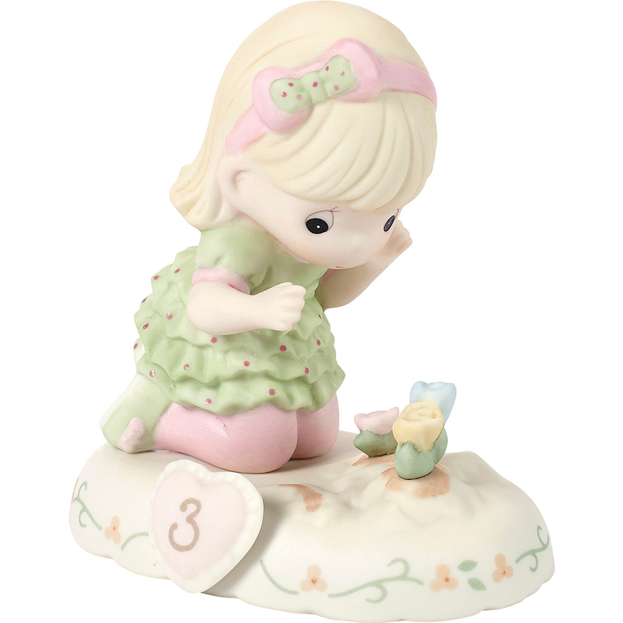 age 3 figurine side
