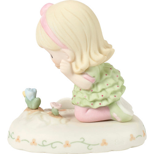 age 3 figurine back
