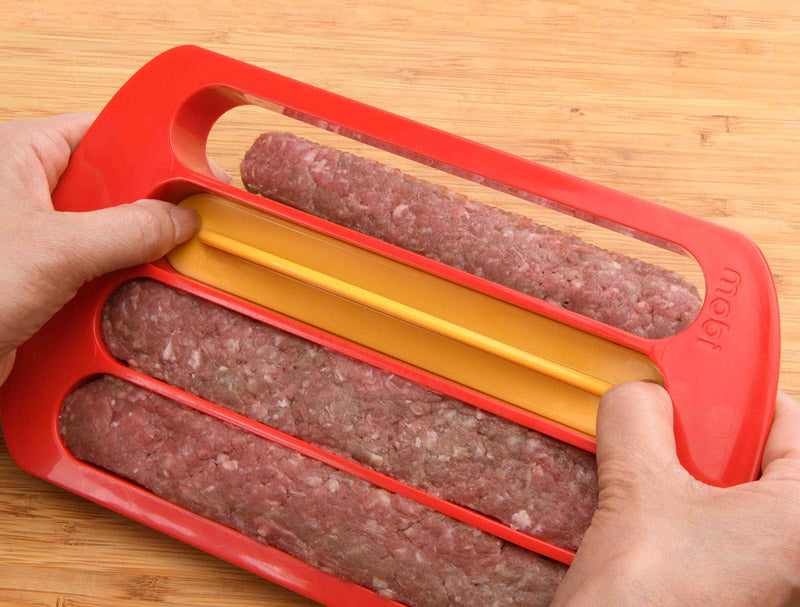 person molding hamburger