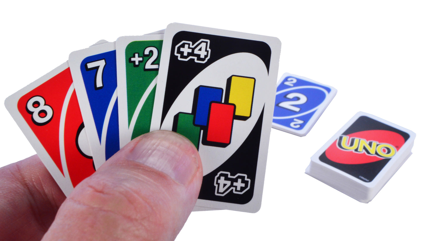 hand holding uno cards