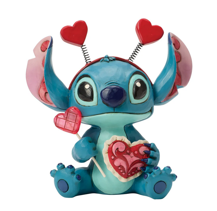 Stitch character figurine with hearts on a white background