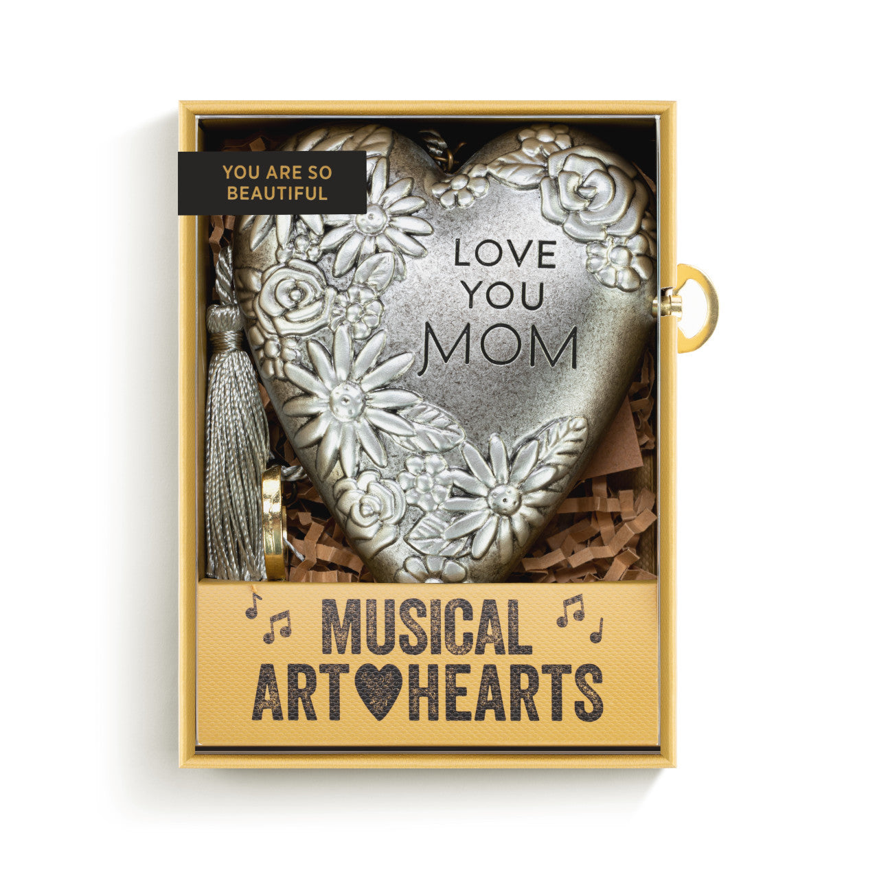 metal musical heart in packaging