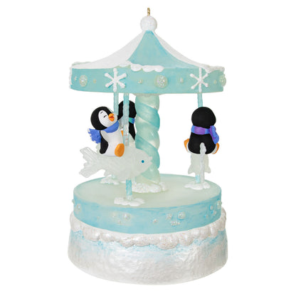 Playful Penguins on Carousel Musical Ornament With Light and Motion