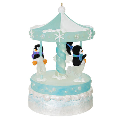 Playful Penguins on Carousel Musical Ornament With Light and Motion