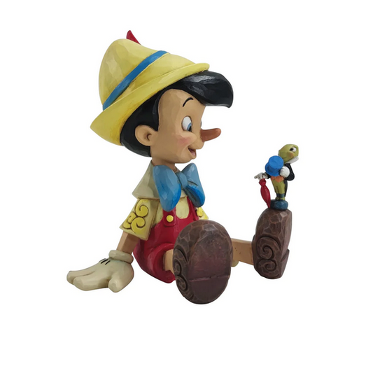 Disney Traditions Pinocchio and Jiminy Sitting by Jim Shore- "Wishful and Wise"