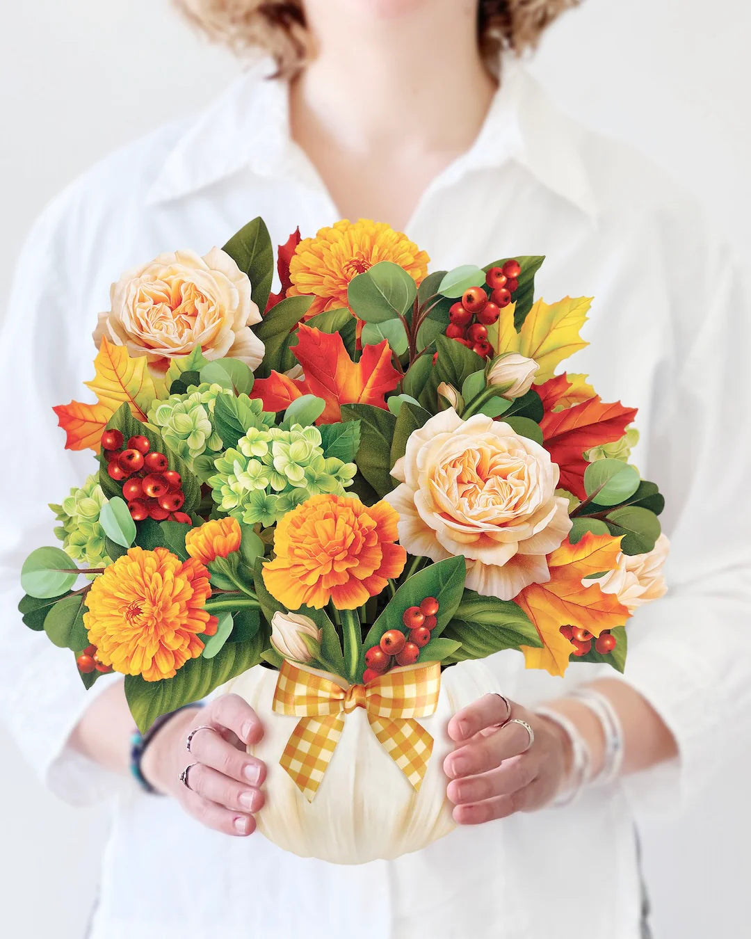 Person holding pop up bouquet