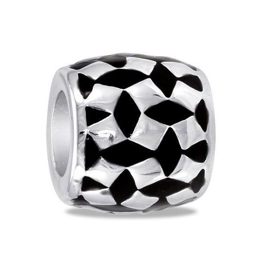 Two-toned (silver and black) bead with trapezoid pattern