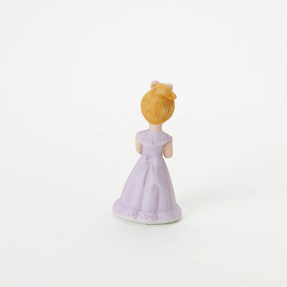 age 4 figurine back