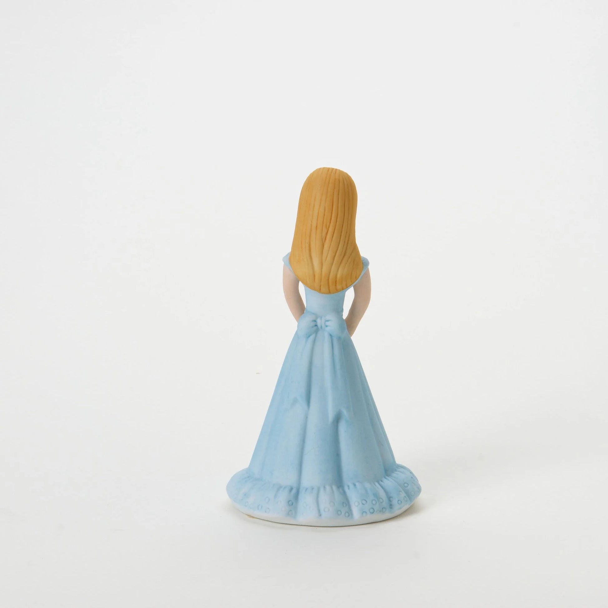 age 10 figurine back