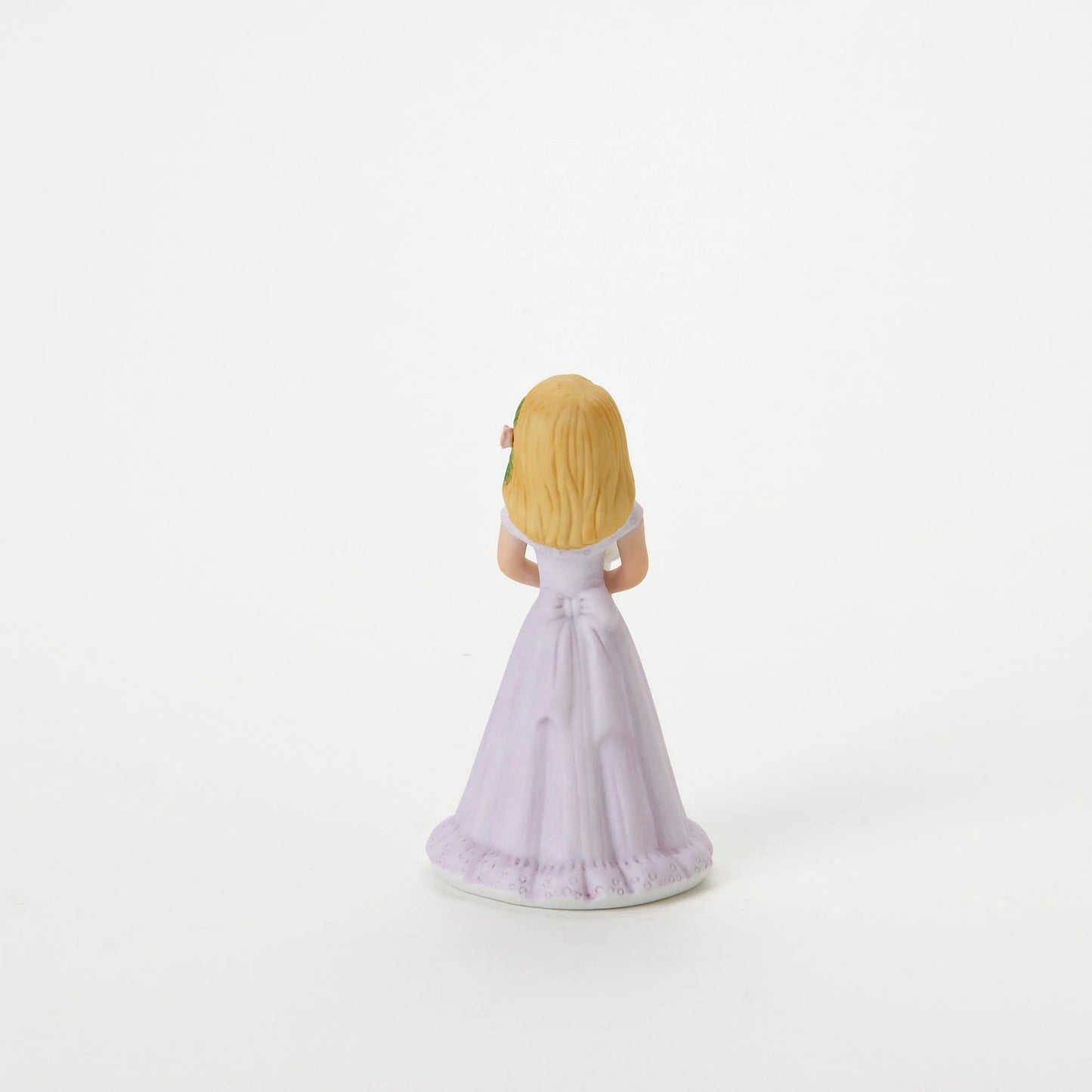 age 8 figurine back