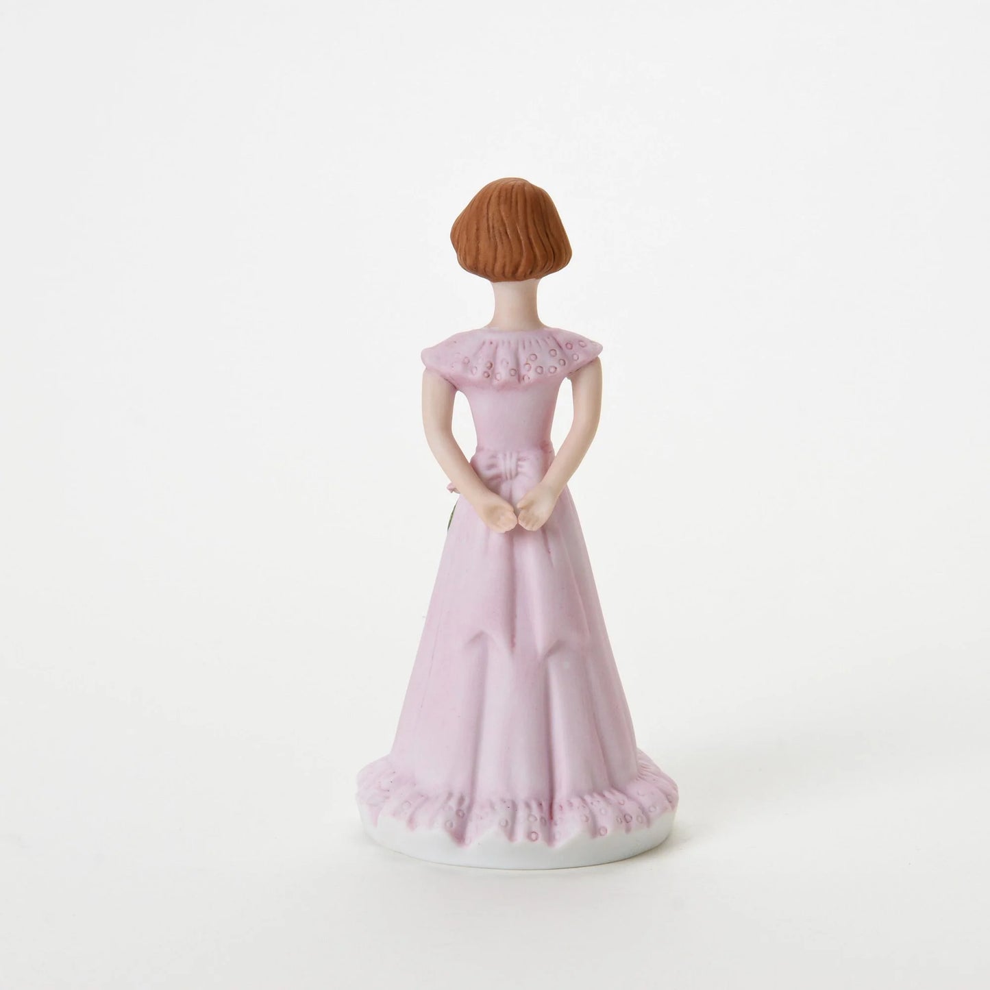 age 13 figurine back