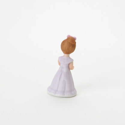 age 4 figurine back