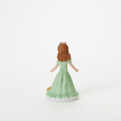 age 7 figurine back