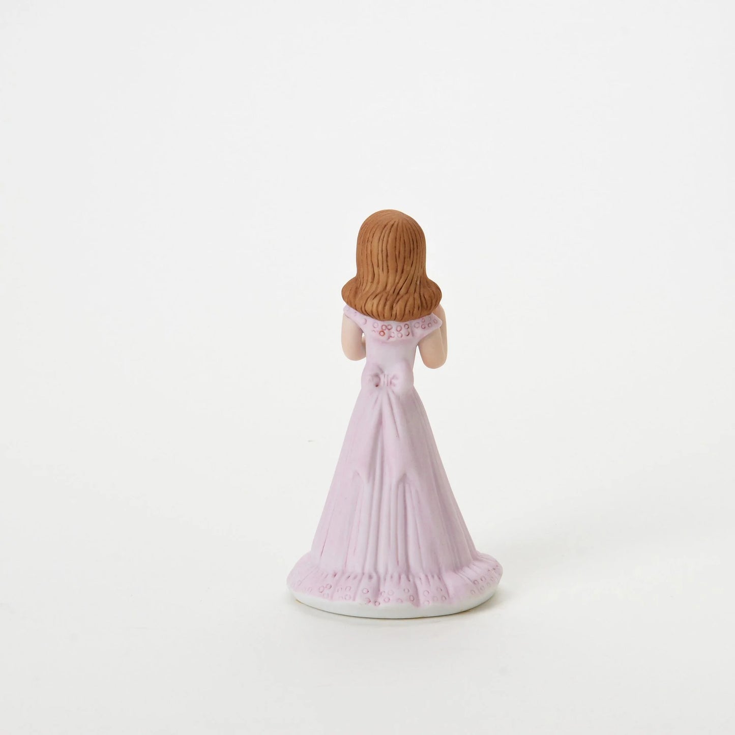 age 9 figurine back