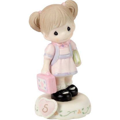 age 5 figurine side