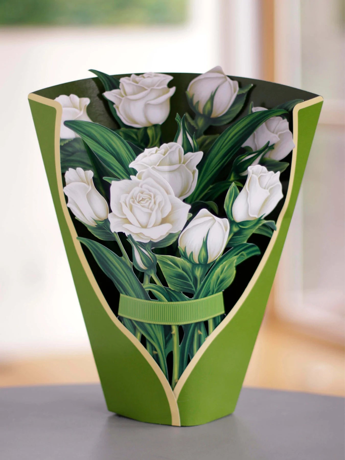 white rose pop-up bouquet on table